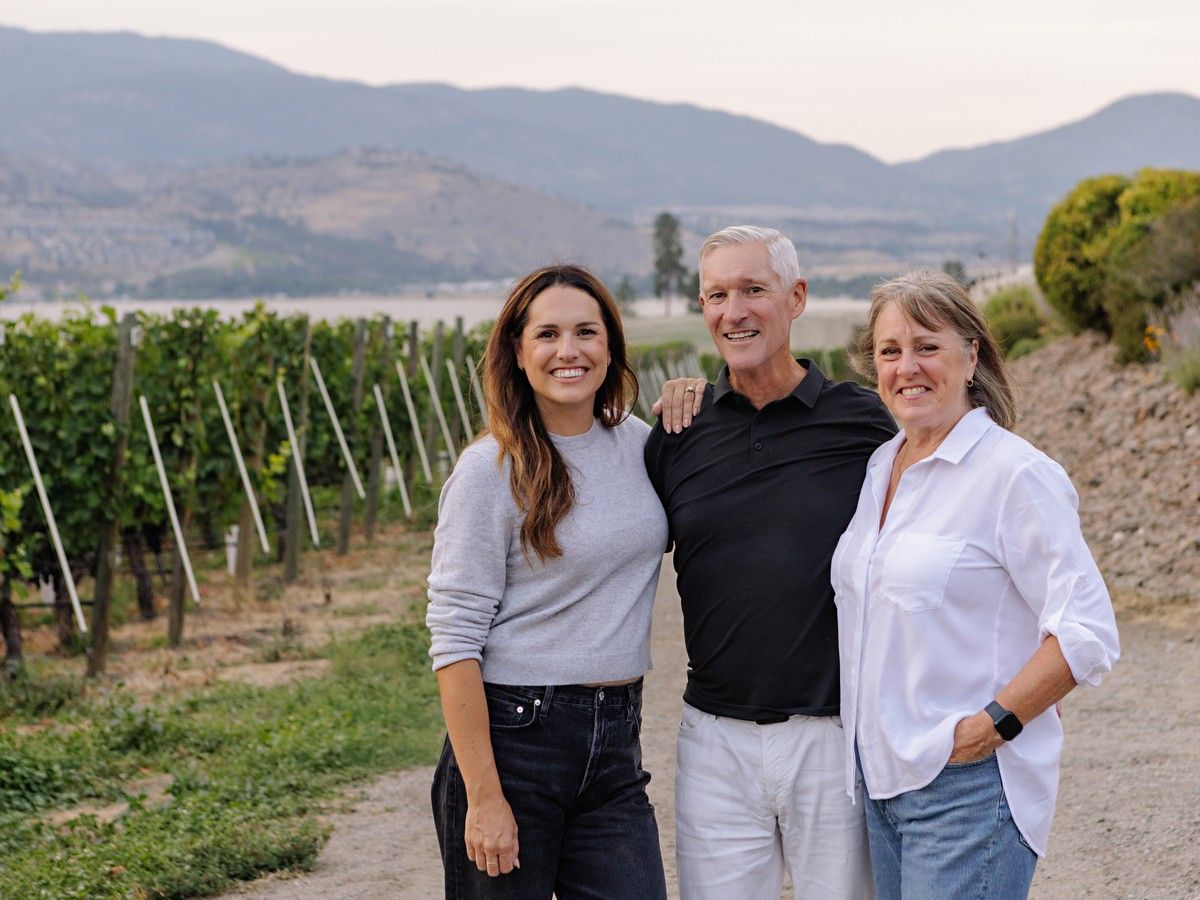From left, Lauren Skinner with her parents, John and Trish Skinner, who founded and own Painted Rock Estate Winery, at the vineyard in Penticton.