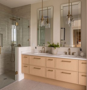 Designed by Studio Ten Interior Design the curbless shower minimizes barriers when entering and exiting, while the handheld shower fixture supports seated or assisted bathing. Wide vanity drawers provide accessible storage without requiring deep reaching, and the generous counter area allows the bathroom to adapt to changing needs over time. The shower also offers the potential for discreet grab-bar reinforcement or the addition of a bench in the future.