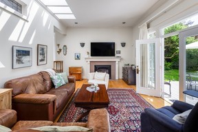 French doors that open to a manicured garden