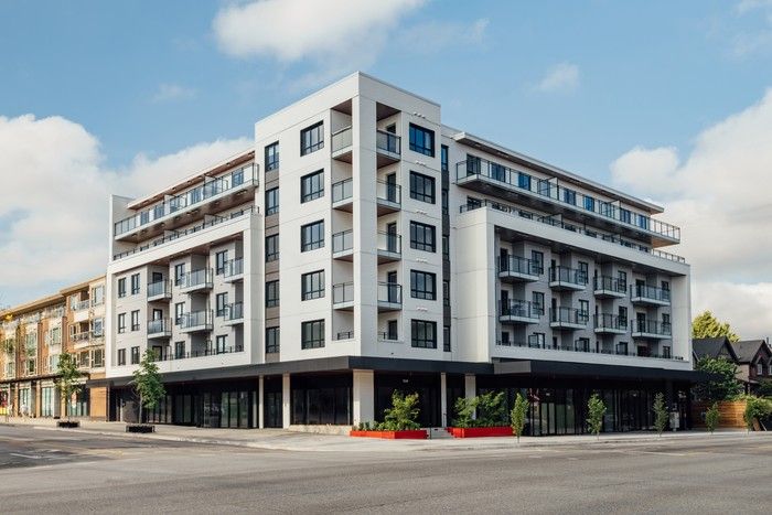 A work hub sits off the lobby on the main floor, which is home to several retail spaces including a café, Merci Boulangerie. A hair salon, wellness and meditation studio and electronics repair shop will also be moving in.