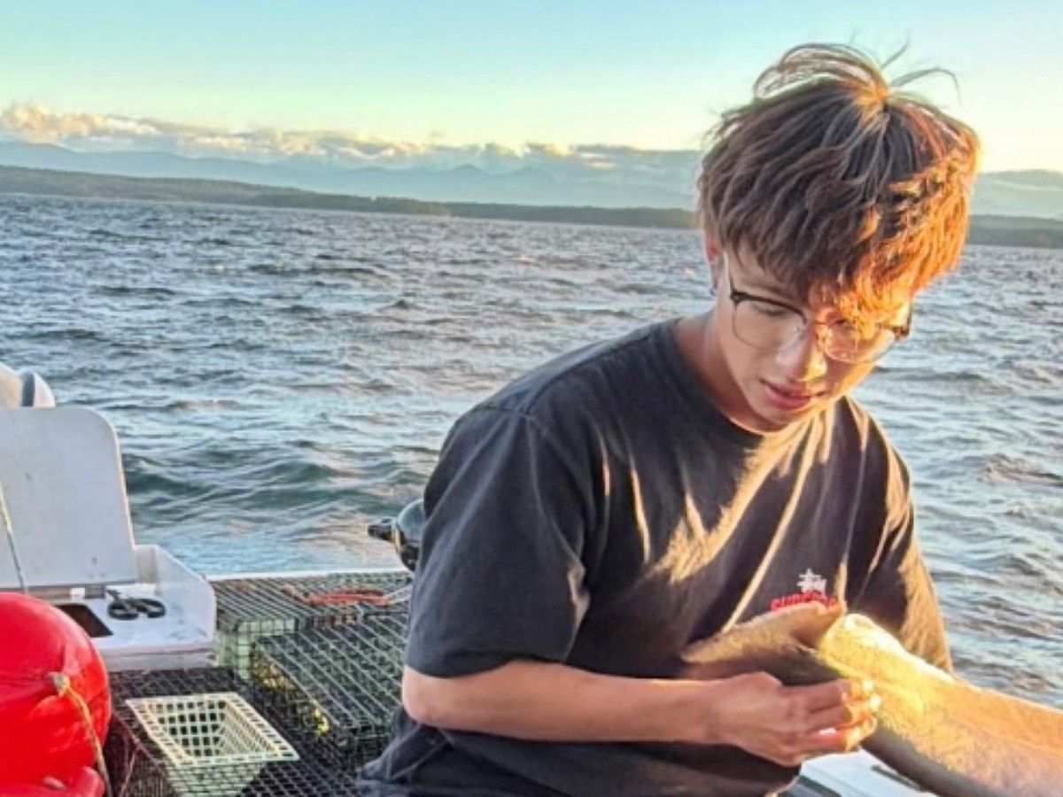 Police located the sunken boat 153 metres below the surface on Wednesday, while confirming that one of the rescued passengers has died