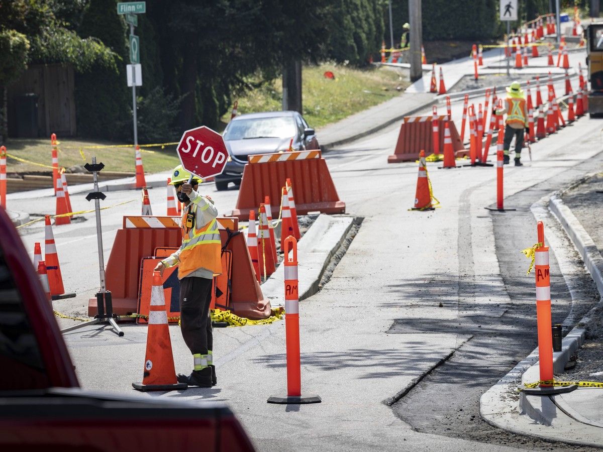 Traffic control workers at a construction site