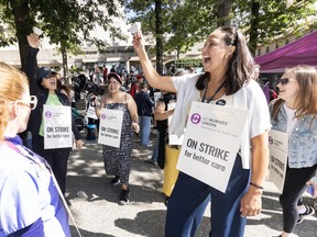 Nurses on picket lines in front of Vancouver General Hospital in Vancouver on July 7, 2026.