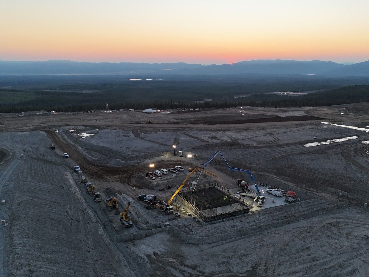 Above is an aerial view of crews pouring the first foundations for a major expansion of Artemis Gold Inc.'s Blackwater gold mine, which is going ahead barely 15 months after its official opening in 2025.