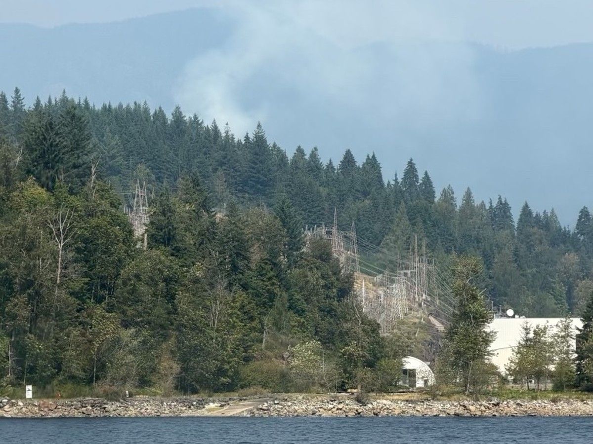 Wildfire burning in Belcarra Park near Village of Anmore