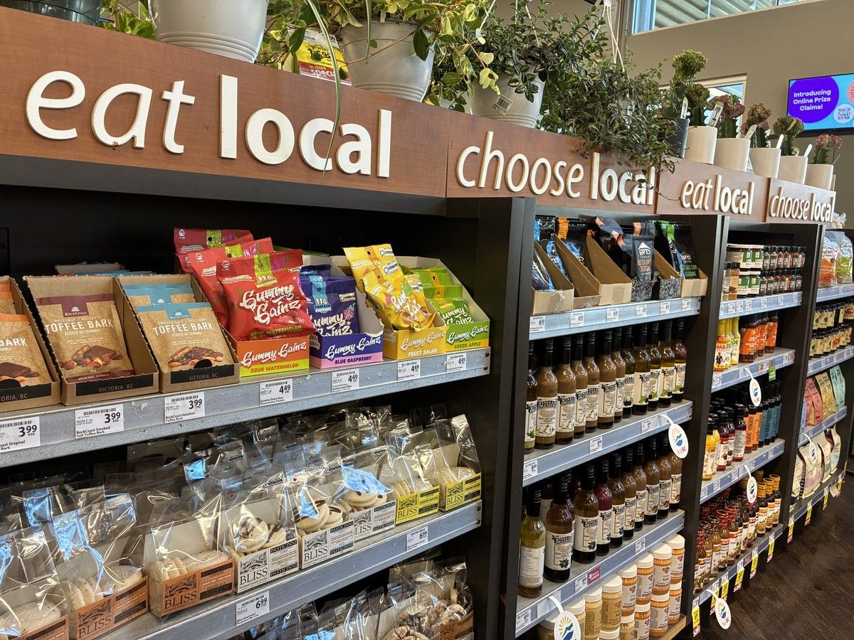  photo of ‘eat local, choose local’ display at the front of a Save On Foods store in Surrey on Monday