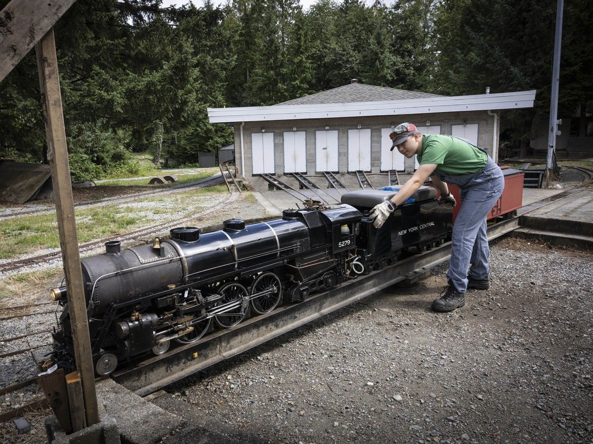  Volunteer engineer Jayden with a steam locomotive Saturday, August 1, 2026.