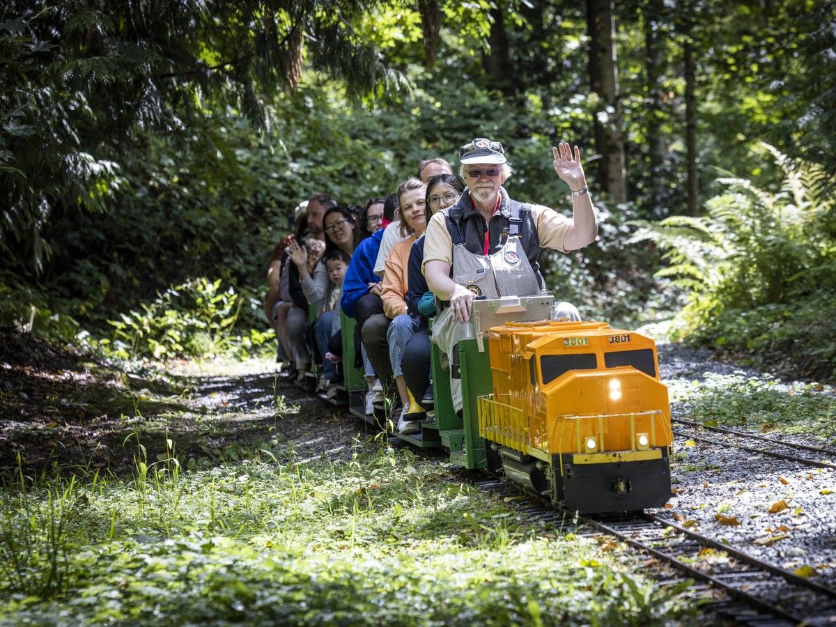  Volunteer engineer Tom Carr with an electric locomotive Saturday, August 1, 2026.