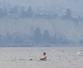 People on Okanagan Lake Beach in Penticton, on Aug. 10, 2026.