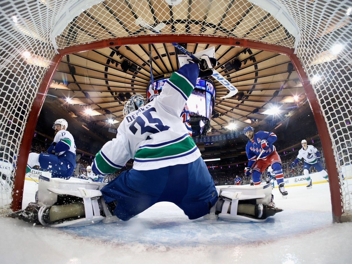 Goalie Thatcher Demko of the Vancouver Canucks stops a shot against the New York Rangers at Madison Square Garden in December 2025.
