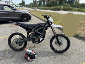 A dirt bike in a parking lot