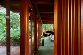 Fred Hollingsworth designs had many interesting features, such as this folding wall which separated a 1958 addition from the original Mahogany House in North Vancouver.