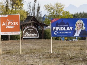 Election signs for NDP candidate Pam Elexis and Conservative Party candidate Kerry-Lynne Findlay for the upcoming Abbotsford-Mission byelection at the entrance to the city of Mission on Wednesday, Sept. 9, 2026.