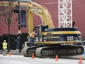 An excavator sits at a construction site