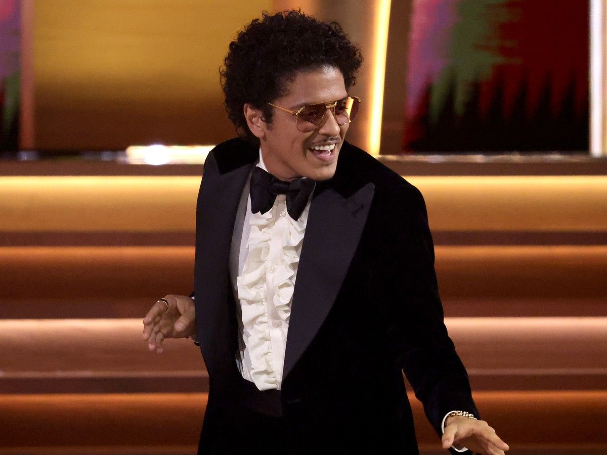 Bruno Mars accepts the song of the Year for 'Leave The Door Open' during the 64th Annual GRAMMY Awards at MGM Grand Garden Arena on April 3, 2022, in Las Vegas.