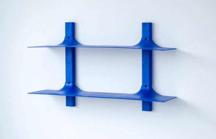 Rupert Jasper's electric-blue Inlay shelving system won the 2026 Prototype Judges Choice Award at IDS Vancouver.