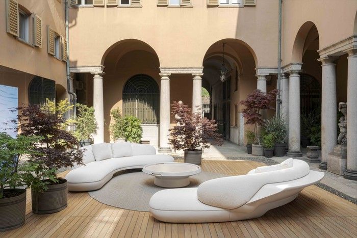 Paolo Ferrari's MC72 for Poltrona Frau pairs a low, aerodynamic silhouette with generous upholstery.