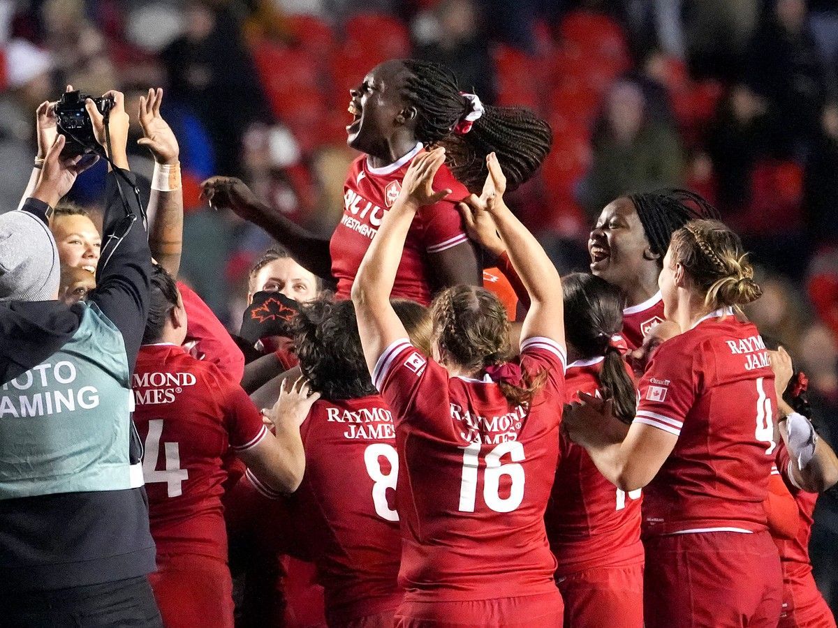Julia Omokhuale of Canada celebrates the win against England with her teammates following the WXV Global Series match at TD Place Stadium on Oct. 23 in Ottawa.