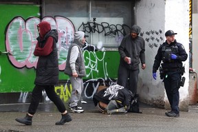 Vancouver Police Department patrol East Hastings St in the Downtown Eastside.