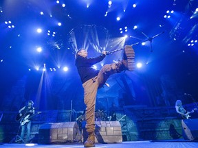 Bruce Dickinson of Iron Maiden sings while performing at Roger Arena in Vancouver, BC, April, 10, 2016. The band is returning to the city in 2027.