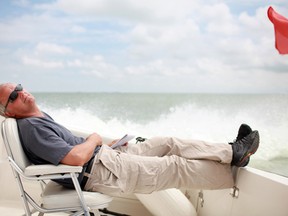 Doug Schmidt is hard at work on Lake Erie in this photo taken by The Star's Dax Melmer.