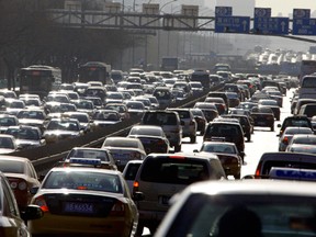 Cars are seen in a traffic jam along a main road in central Beijing December 16, 2009.