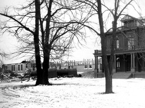Exterior of the original Grace Hospital with construction in the background of the current building. (The Windsor Star-File) No DATE  USED ONLINE