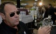 In this file photo, Dan Ackroyd touts new brand of alcohol in a Saskatchewan liquor store. (BRYAN SCHLOSSER/Leader-Post)