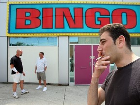 In this 2006 file photo, smokers take a break outside Derby Bingo in Windsor, Ont. (Windsor Star files)