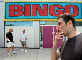 In this 2006 file photo, smokers take a break outside Derby Bingo in Windsor, Ont. (Windsor Star files)