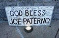 A "God Bless Joe Paterno" sign is seen outside Beaver Stadium before the start of the NCAA football game between Penn State and Nebraska in the wake of the Jerry Sandusky scandal on November 12, 2011 in State College, Pennsylvania.  (Mario Tama/Getty Images)