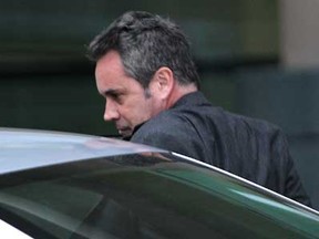 John Lanoue, owner of of A&L Auto Recyclers gets into a car outside of Ontario Court on Dec. 6, 2011. (Windsor Star files)
