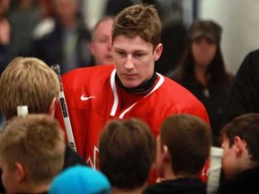 Hockey sensation Nathan MacKinnon is interviewed after a workout with the under-17 hockey Pacific team at the Vollmer Complex in LaSalle, Ontario on December 28, 2011. (Photo By: Dax Melmer)
