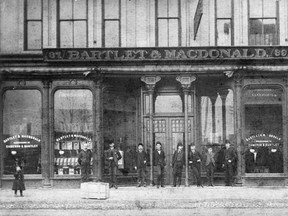 Bartlet, MacDonald and Gow importers of Dry Goods. 116-122 Ouellette Ave. AND 17-23 Sandwich St.  Left to right, E.W.S. Baurer,Fred Wickham, Fred Housen,  A.W.Cronk, Alex Janisse, Tom Brown, Dick Bowden and Alex Gow.(The Windsor Star-FILE)