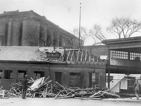 Feb.23/1944-Work is underway to remove the old Walkerville Ferry building which occupy the site of the proposed new grain elevator to be erected by the Hiram Walker and Sons Grain Corporation Limited, on the riverfront. Workers are shown salvaging the substantial buildings, all of which will be removed to make way for the big elevator which will house more than a million and a quarter bushels of grain at one time. (The Windsor Star-FILE)