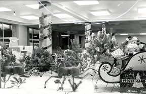 Dec.1956-Windsor Utilities Commission Santa Claus with all his reindeers fill the window of the Windsor Utilities Commission at the corner of Ouellette ave. and Elliott. It's one of the largest displays in the city. (The Windsor Star- FILE)