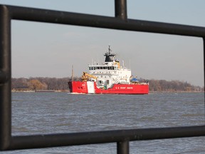 The U.S. Coast Guard ship Mackinaw is framed by a fence at the Alexander Park in Windsor, Ont. as it makes its way down the Detroit River Wednesday, Jan. 4, 2012. (Photo By: Dan Janisse/The Windsor Star)The U.S. Coast Guard ship Mackinaw is framed by a fence at the Alexander Park in Windsor, Ont. as it makes its way down the Detroit River Wednesday, Jan. 4, 2012. (Photo By: Dan Janisse/The Windsor Star)