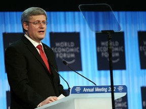Stephen Harper, Prime Minister of Canada addresses, on January 26, 2012, participants at the World Economic Forum (WEF) in the congress centre of the Swiss resort of Davos. (AFP Photo/Vincenzo Pinto)