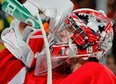 Jimmy Howard #35 of the Detroit Red Wings takes a drink while playing the Phoenix Coyotes at Joe Louis Arena on January 12, 2011 in Detroit, Michigan. Detroit won the game 3-2 in a shootout. (Photo by Gregory Shamus/Getty Images)