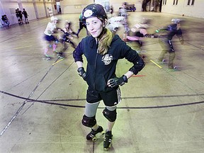 Border City Brawlers Jaime Guthrie poses at the downtown Armouries building recently. (DAN JANISSE/The Windsor Star)