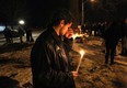 Family and friends of Sharri Lluhani gathered Monday, Jan. 30, 2012, for a vigil to remember the 24-year-old who was killed Sunday morning in a crash on Riverside Dr. E. Close friend Leke Gjocaj breaks down during the vigil. (Dan Janisse/The Windsor Star)