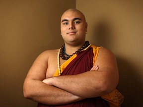 A.J. Happy, 23, dresses as a Buddhist monk for the Transition to Betterness gala at the Ciociaro Club, Saturday, Jan. 29, 2012. (DAX MELMER / The Windsor Star)