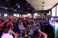 More than 200 sports fans filed into John Max Sports and Wings Bar on Dougall Avenue to watch the Detroit Lions take on the New Orleans Saints on Saturday, Jan. 7, 2012. The Lions ended up losing 45 - 28 against the Saints. (DYLAN KRISTY/The Windsor Star).