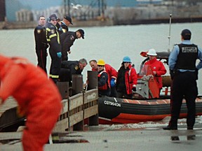 Emergency crews converge on the Detroit River after reports woman has fallen into water. (Photo By: Jason Kryk)