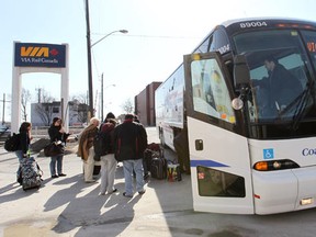 Via rail passengers arrive Monday, Feb. 27, 2012, by bus at the Windsor, Ont. station. The rail line was not being used due to the derailment in Burlington. (Dan Janisse)