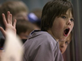 Cole Morrison, 10, reacts to a goal score by the Waterloo Warriors at the University of Windsor Lancers men's hockey team's final regular season game at Windsor Arena Saturday, Feb. 10, 2012. The Lancers won 6-3. (KRISTIE PEARCE/The Windsor Star) )