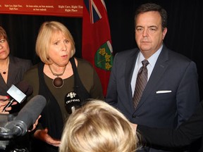 Teresa Piruzza, left, MPP Windsor West, Deb Matthews, Minister of Health and Long-Term Care and Dwight Duncan, right, Minister of Finance speak to reporters following a Chamber of Commerce luncheon held at Giovanni Caboto Club of Windsor February 3, 2012. (NICK BRANCACCIO/The Windsor Star)