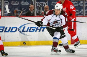 Steve Downie #27 of the Colorado Avalanche plays the puck against the Detroit Red Wings during their NHL game at Joe Louis Arena on February, 2012 in Detroit, Michigan. (Photo by Dave Sandford/Getty Images)