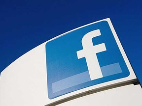 Facebook Inc. signage is displayed outside the company's new campus in Menlo Park, California, U.S., on Friday, Dec. 2, 2011. Photograph by: David Paul Morris/Bloomberg