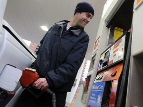 Brad Yoell fills up his tank in this file photo. (Tyler Brownbridge/The Windsor Star)